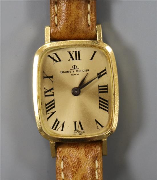 A ladys 18ct gold Baume & Mercier manual back wind wrist watch.